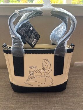 Loungefly Cream and Black Alice Illustration Satchel